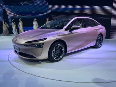 Sleek electric sedan with sharp LED headlights and aerodynamic design