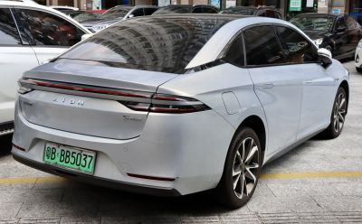 Sleek rear design with integrated taillight and aerodynamic lines.