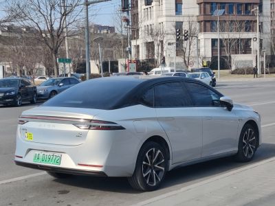 Rear and side profile with LED tail lights and tinted windows