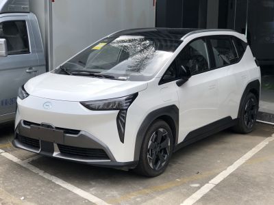 White compact electric SUV with LED headlights and aerodynamic styling