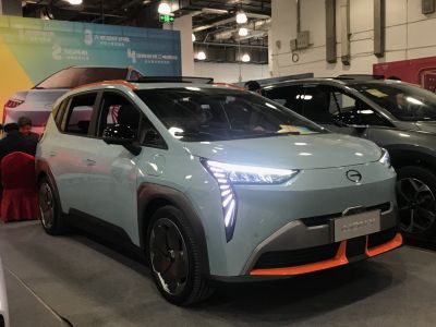 Electric SUV front & side view with distinct angular LED headlights and aerodynamic shape