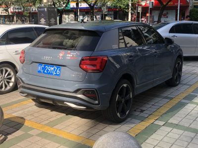 Rear and side view of a compact SUV with distinctive taillights and tinted windows
