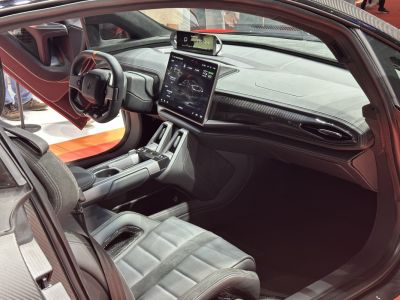 Futuristic car interior with touchscreen and digital instrument cluster