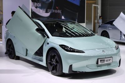 Butterfly doors and aerodynamic front design