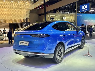 Sleek rear of a blue electric SUV with modern taillights
