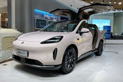 Electric vehicle with gullwing doors and advanced lighting elements