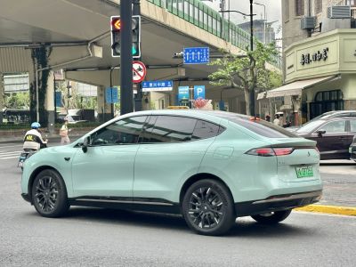 Electric SUV with coupé rear design and dark alloy wheels