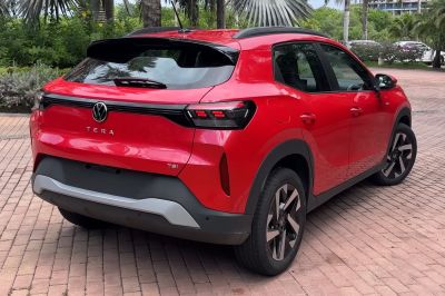 Rear view of a red SUV with LED tail lights and sporty alloy wheels