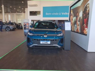 Front view of blue Volkswagen Tera in showroom