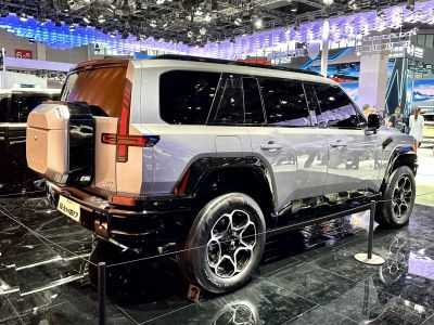 Angular rear and side view of modern SUV with unique taillights and rugged wheels