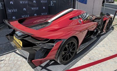 Rear aerodynamic wing and exhaust system with carbon fiber diffuser