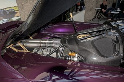 Carbon fiber rear components and detailed exhaust system with suspension.