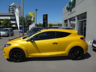 Yellow coupe with black wheels and tinted windows