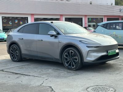 Sleek electric crossover with smooth aerodynamic profile and modern LED lighting