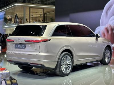 SUV rear view with sleek taillights and alloy wheels