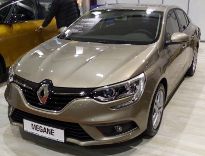 Front view of sedan with LED headlights and chrome grille