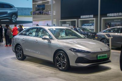 Sleek silver sedan with sharp LED headlights and stylish alloy wheels