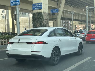 Rear view of a sedan with sleek taillights and smooth body lines