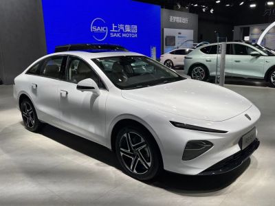 Sleek electric sedan with slim LED headlights and aerodynamic shape