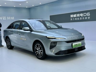 Sleek modern electric sedan with slim LED headlights and aerodynamic body