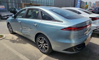 Electric sedan rear with smooth lines and LED tail lights
