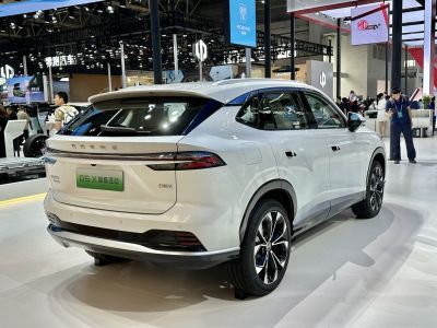 Rear and side view of a modern SUV with sleek taillights and stylish alloy wheels.