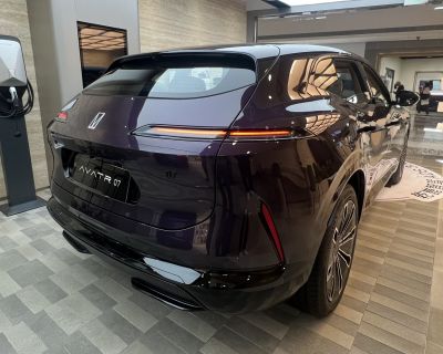 Sleek rear view with continuous LED taillights and aerodynamic shape
