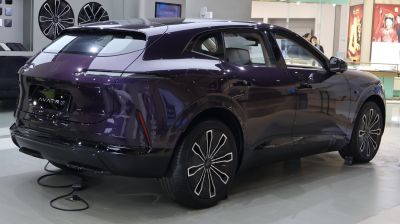 Sleek rear and side design with aerodynamic body and unique alloy wheels