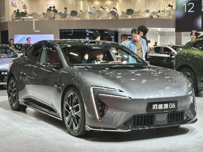 Sleek electric sedan with sharp LED headlights and aerodynamic styling