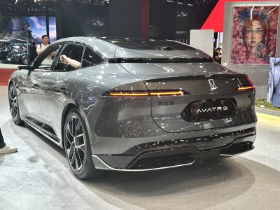 Sleek rear design with continuous tail light strip and aerodynamic contours