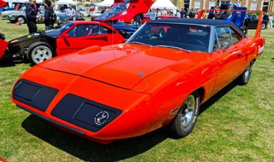 Muscle car with aerodynamic nose cone and tall rear wing