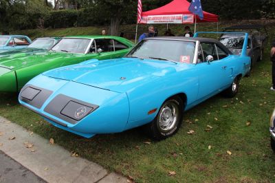 Aerodynamic nose cone and tall rear wing of a classic muscle car