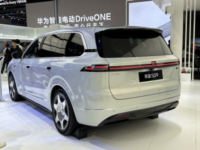 Rear view of electric SUV with continuous LED light bar and aerodynamic rear design