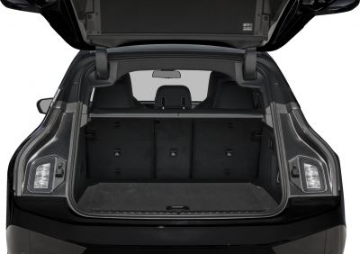 Spacious rear cargo space of an electric SUV with open trunk