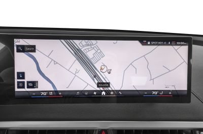 Wide digital navigation screen with map and climate controls