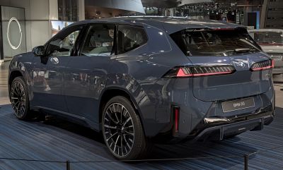Sleek electric SUV rear with LED taillights and large alloy wheels