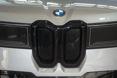 Front grille and BMW emblem close-up on electric vehicle