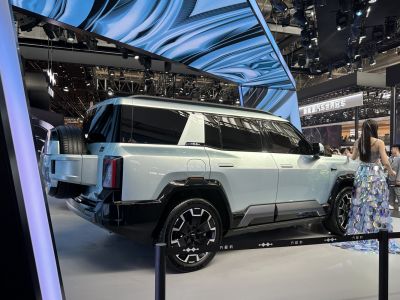 Boxy SUV design with rear spare tire and tinted windows