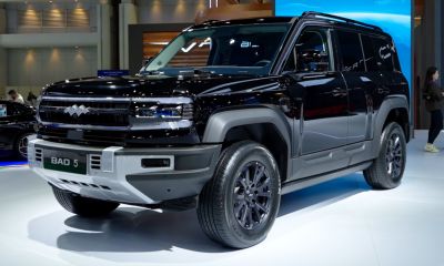 Front and side SUV view with bold grille and rugged design