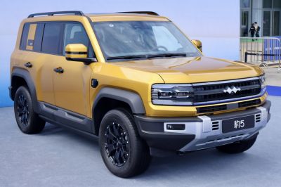 Boxy SUV with modern grille and all-terrain wheels