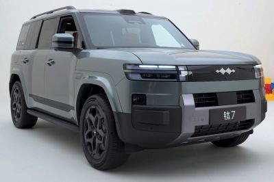 Modern SUV front three-quarter view with LED headlights and rugged design