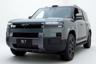 Front view of SUV with LED headlights and bold grille