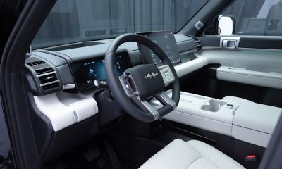 Modern digital dashboard and large touchscreen infotainment system with minimalist interior design