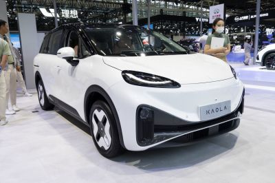 Sleek electric compact crossover SUV with LED headlights and unique wheel design