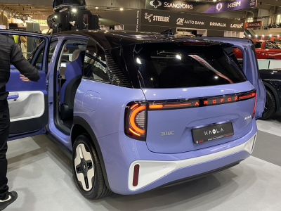 Rear design with illuminated taillights and open rear door