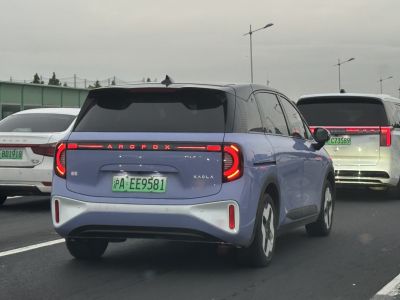 Rear view with LED light bar and rounded taillight design