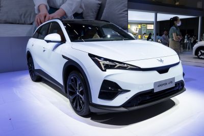 Futuristic electric SUV with sharp LED headlights and sleek aerodynamic design