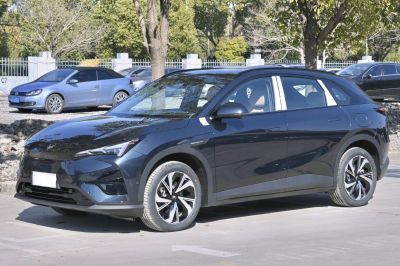 Electric SUV with sharp LED headlights and aerodynamic body design