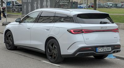 Sleek rear and side profile of electric touring wagon with LED tail lights