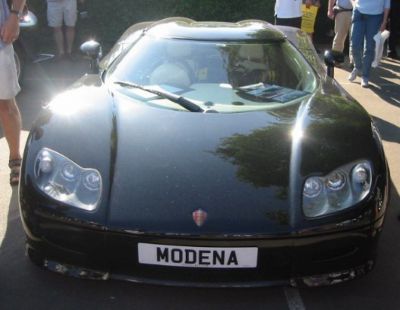 Front view with quad headlights and aerodynamic hood